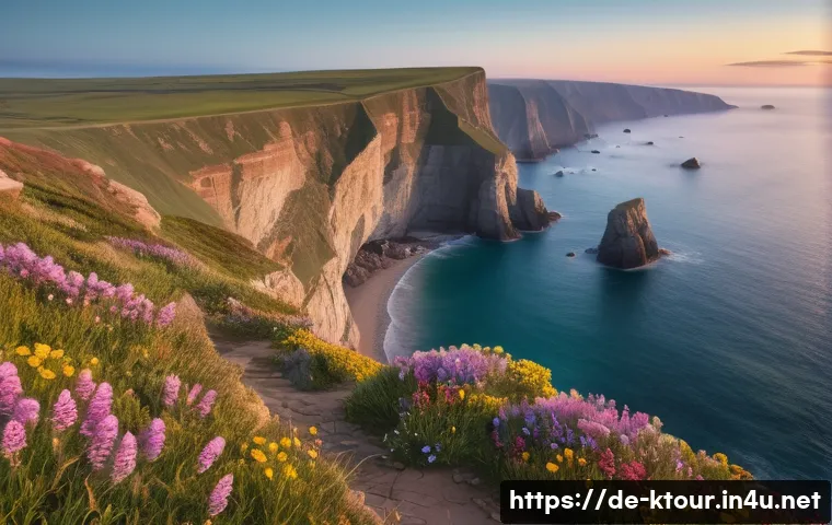 강릉 경포대 드라이브 - A breathtaking coastal cliff scene at early morning with soft mist hovering over the deep blue sea, ...